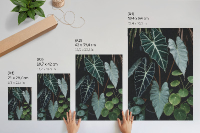 Wandposter Groene bladeren contrasteren met een donkere, moderne achtergrond.