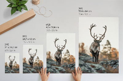 Decoratieve poster Herten tegen een achtergrond van rotsen en bomen in een herfstlandschap.