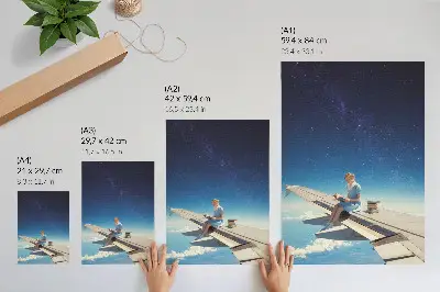 Decoratieve poster meisje op de vleugel van een vliegtuig in een universum van boeken