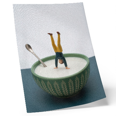 Wandposter Figuurtje in een kom melk met groene bladeren