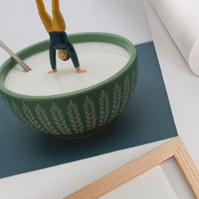 Wandposter Figuurtje in een kom melk met groene bladeren
