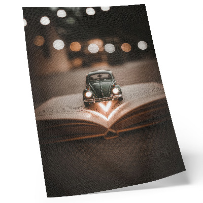 Wandposter Miniatuurauto op een boek met magische lichtjes