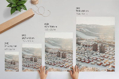 Wandposter Winterlandschap met met sneeuw bedekte huizen
