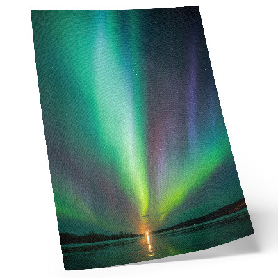 Poster Het noorderlicht boven een nachtelijk landschap vol sterren