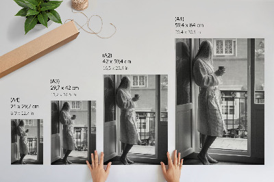 Wandposter Persoon bij het raam, kopje koffie, rust