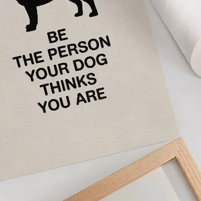 Decoratieve poster met motivatie en een hond