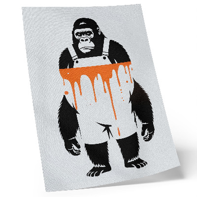 Poster Een gorilla in een overall tegen een feloranje achtergrond.