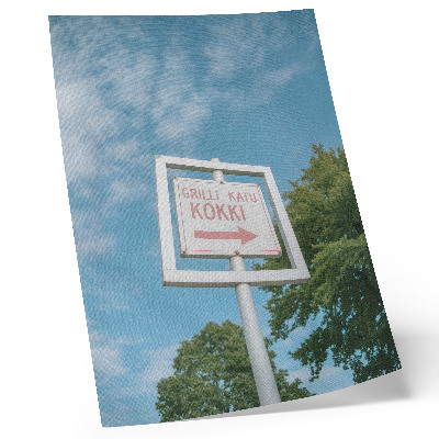 Decoratieve poster Een wit schoolbord tegen een blauwe lucht.