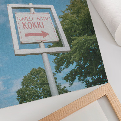 Decoratieve poster Een wit schoolbord tegen een blauwe lucht.