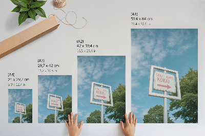Decoratieve poster Een wit schoolbord tegen een blauwe lucht.