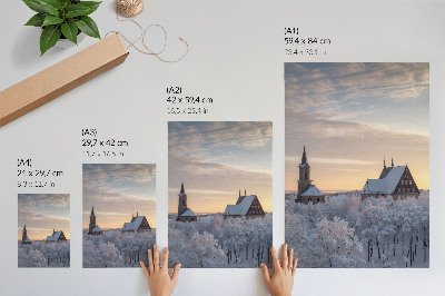 Decoratieve poster Winterlandschap met een met sneeuw bedekte kerk