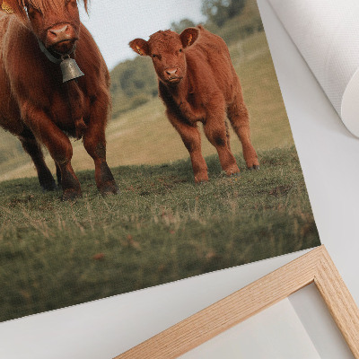 Decoratieve poster Rustiek vee tegen een achtergrond van groen en bomen.