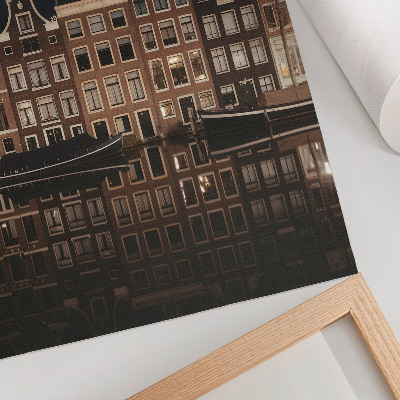 Wandposter Nachtelijke stad weerspiegeld in het water