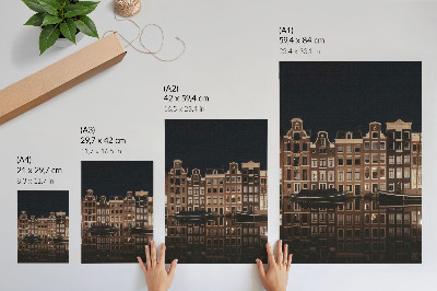 Wandposter Nachtelijke stad weerspiegeld in het water
