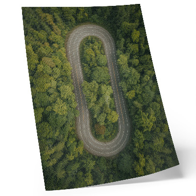 Decoratieve poster Een smalle, kronkelende weg door het groene bos.