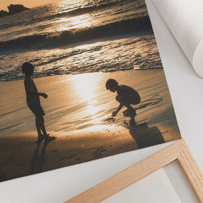 Poster Kinderen op het strand bij zonsondergang