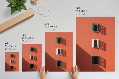 Poster Oranje muur, drie ramen, groene jaloezieën