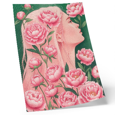 Poster Een vrouw te midden van roze pioenrozen tegen een groene achtergrond.