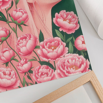 Poster Een vrouw te midden van roze pioenrozen tegen een groene achtergrond.