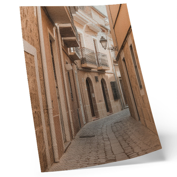 Decoratieve poster Smalle straat, stenen gebouwen, warme tinten