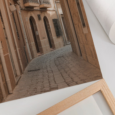 Decoratieve poster Smalle straat, stenen gebouwen, warme tinten