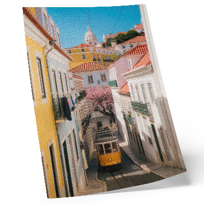 Poster Een straat met een tram, pastelkleurige huizenblokken, bloemen