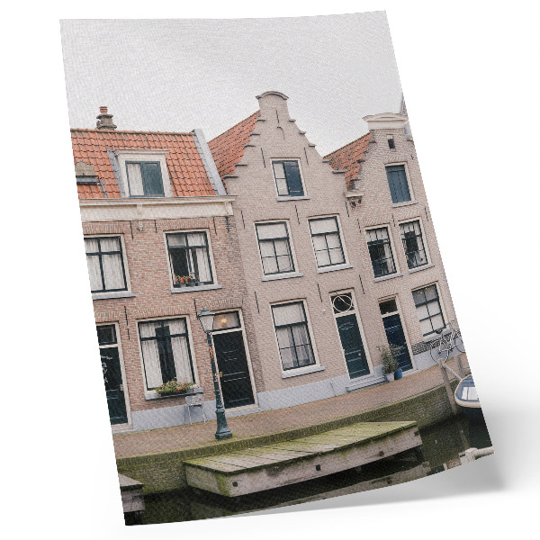 Wandposter Bakstenen huurkazernes met rode pannendaken