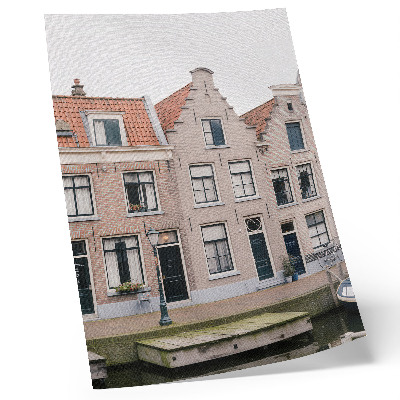 Wandposter Bakstenen huurkazernes met rode pannendaken