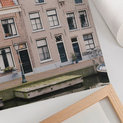 Wandposter Bakstenen huurkazernes met rode pannendaken