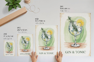 Decoratieve poster Een glas gin, rozemarijn en citroen op een groene achtergrond.