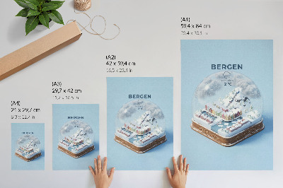 Poster Een miniatuurstadje in een sneeuwbol.