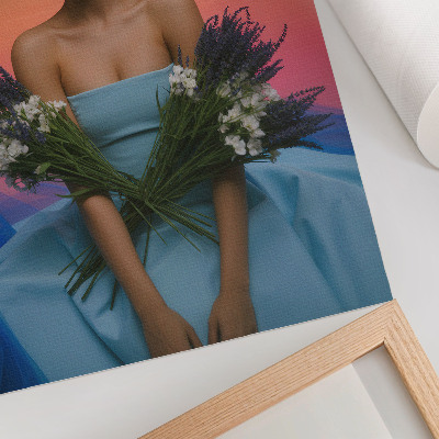 Poster Vrouw met bloemen tegen de achtergrond van een zonsondergang