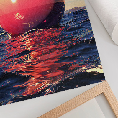Poster Een enorme bal op het water in warme kleuren.