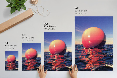 Poster Een enorme bal op het water in warme kleuren.