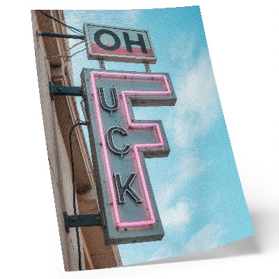 Poster Neon retro reclamebord met intense kleuren in een blauwe lucht.
