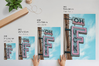 Poster Neon retro reclamebord met intense kleuren in een blauwe lucht.