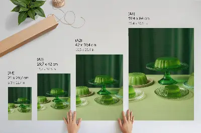 Decoratieve poster met groene gelei op verschillende borden
