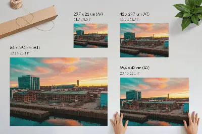 Poster industriële gebouwen bij een vredige zonsondergang