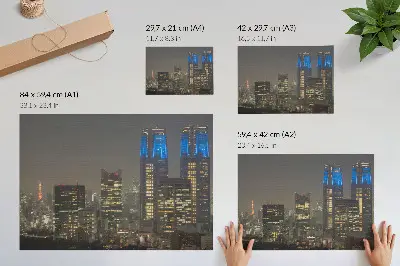 Poster wolkenkrabbers verlicht 's nachts met moderne stadsgebouwen