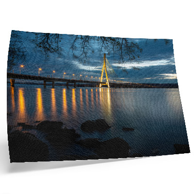 Poster Verlichte brug over het water 's nachts