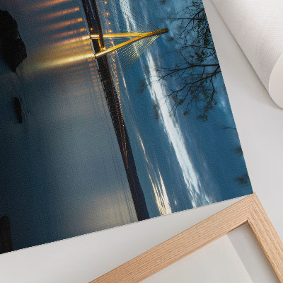 Poster Verlichte brug over het water 's nachts