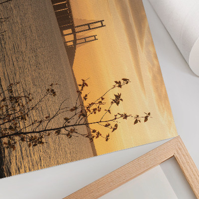 Moderne decoratieve poster Brug bij zonsondergang met een boom