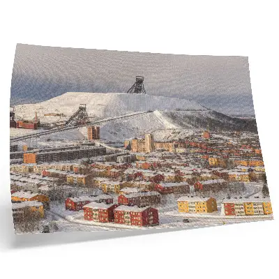Poster winterstadje met kleurrijke gebouwen in de sneeuw