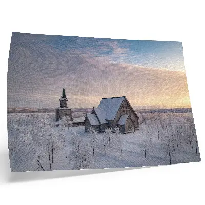 Wandposter vredig winterlandschap met een houten kerk
