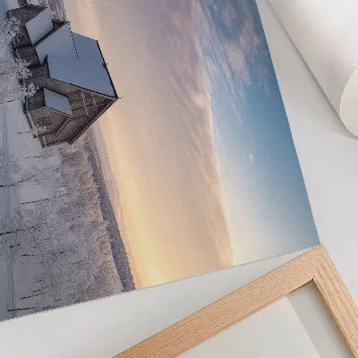 Wandposter vredig winterlandschap met een houten kerk