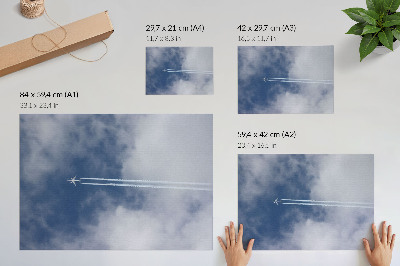 Poster Vliegtuig in de blauwe lucht met witte strepen