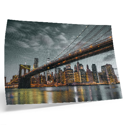 Stijlvolle wandposter Panorama van de avond met de verlichte stadsbrug en het water
