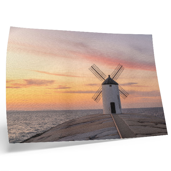 Stijlvolle wandposter Windmolen in het licht van de zonsondergang, zee, pastelkleurige lucht