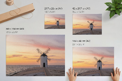 Stijlvolle wandposter Windmolen in het licht van de zonsondergang, zee, pastelkleurige lucht