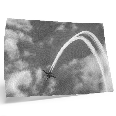 Moderne decoratieve poster Vliegtuig in de lucht met dynamische wolkenstrepen.